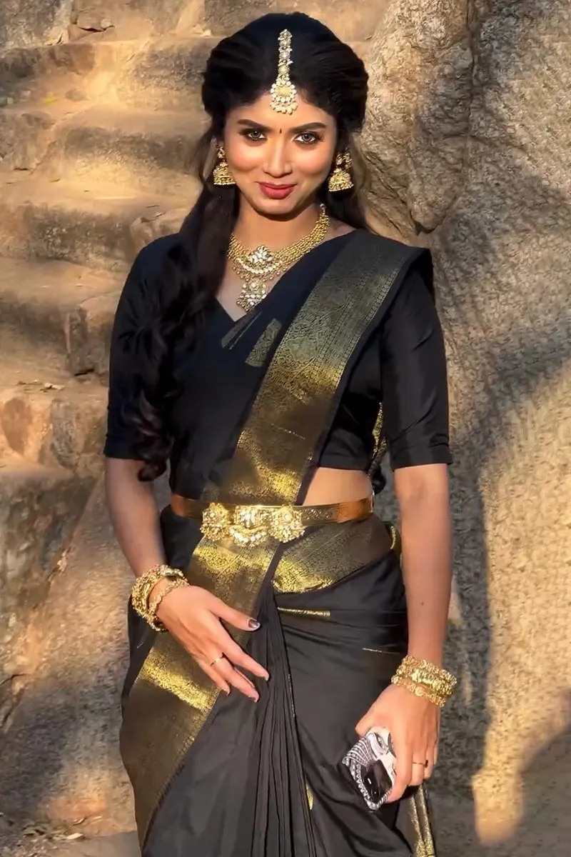 Conflate Black Soft Silk Saree With Demure Blouse Piece