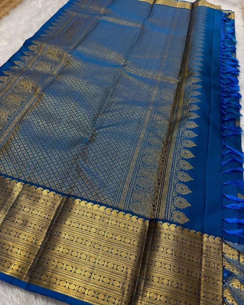 Lustrous Blue Soft Silk Saree With Enigmatic Blouse Piece