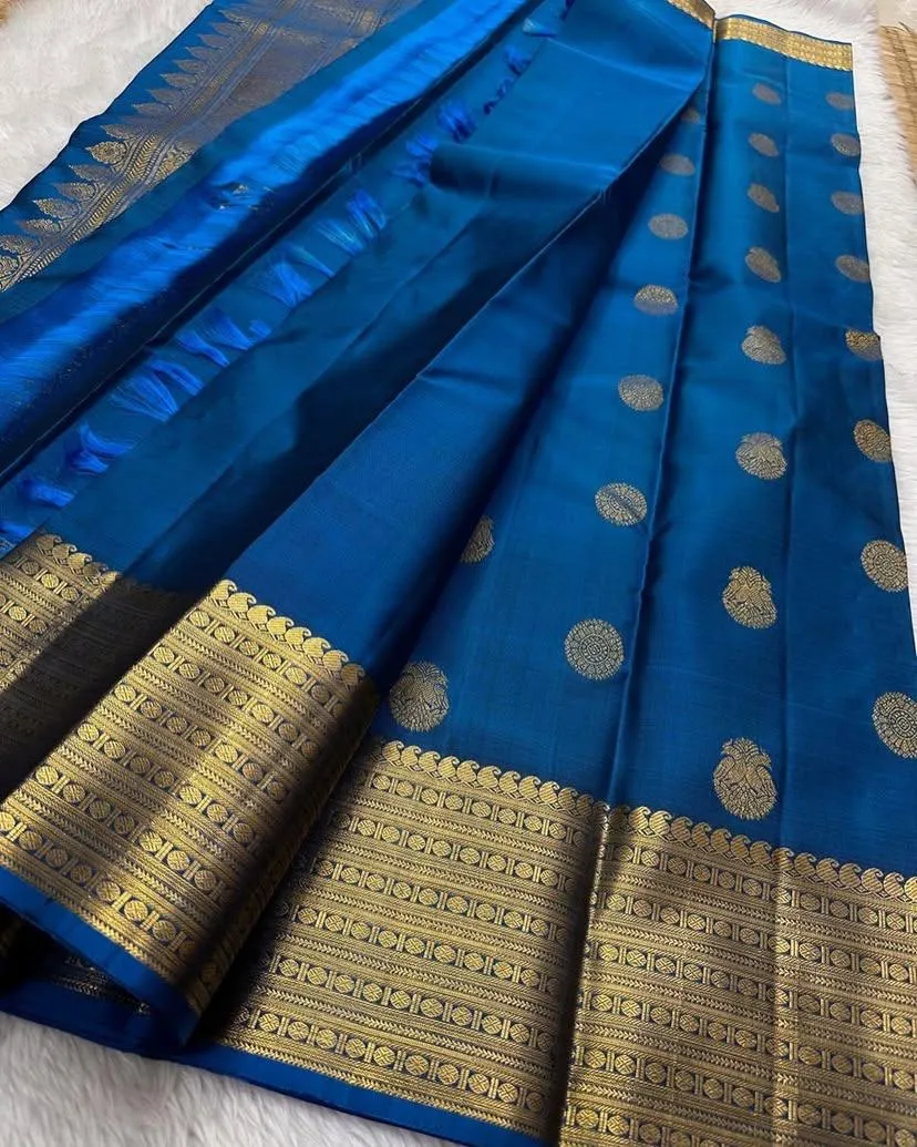 Lustrous Blue Soft Silk Saree With Enigmatic Blouse Piece